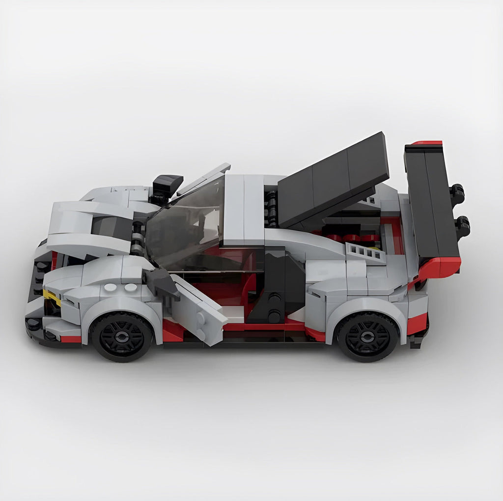 Audi R8 GT3 building blocks kit with 394+ self-locking bricks, made from durable ABS plastic, replicating the iconic racing car in a compact model