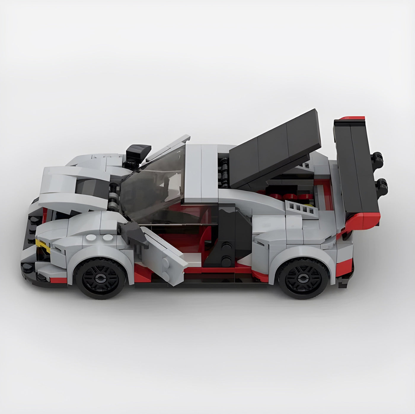 Audi R8 GT3 building blocks kit with 394+ self-locking bricks, made from durable ABS plastic, replicating the iconic racing car in a compact model