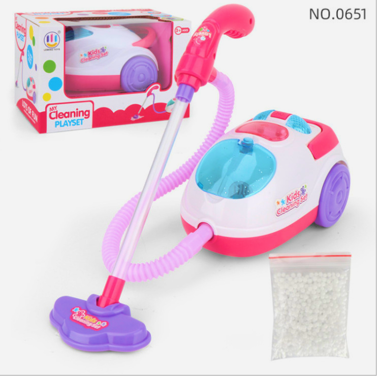 Children's pretend cleaning set featuring a cute handheld vacuum cleaner with sound and light effects in a window color box