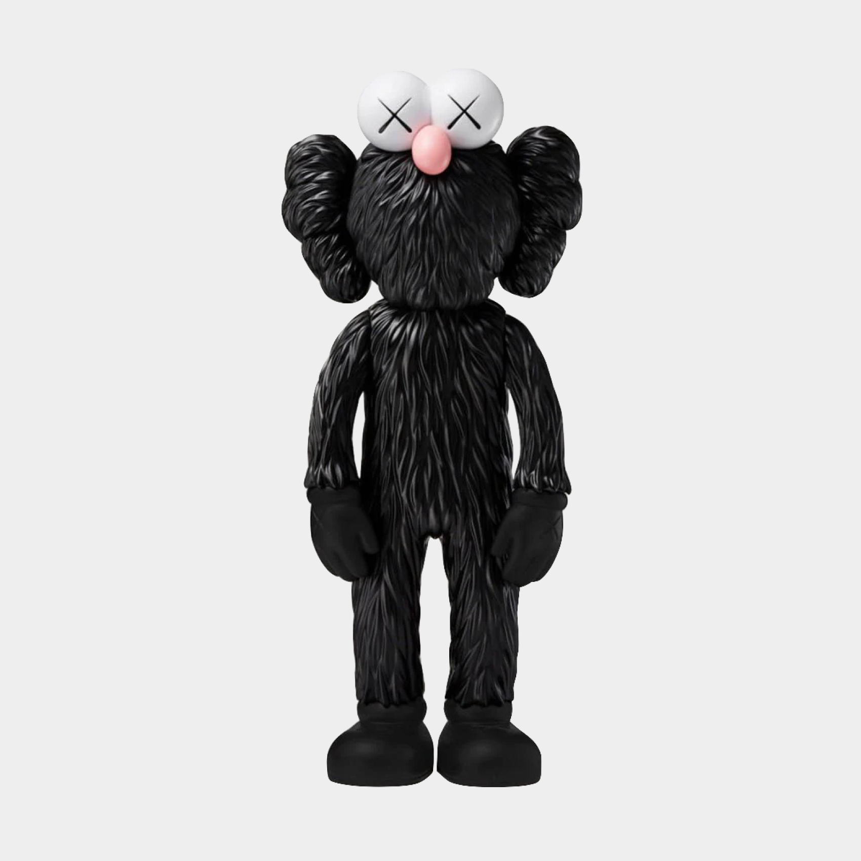 KAWS Companion figure in pink and black from the BFF Open Edition series, measuring 35.6 x 16 x 9.9 cm