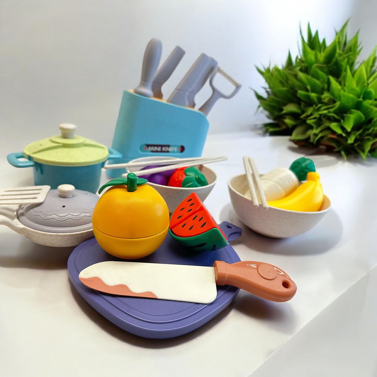 Colorful 10-piece fruit and vegetable cutting play set for kids aged 3-6, featuring realistic fruits, vegetables, and a plastic knife, packaged in an attractive color box