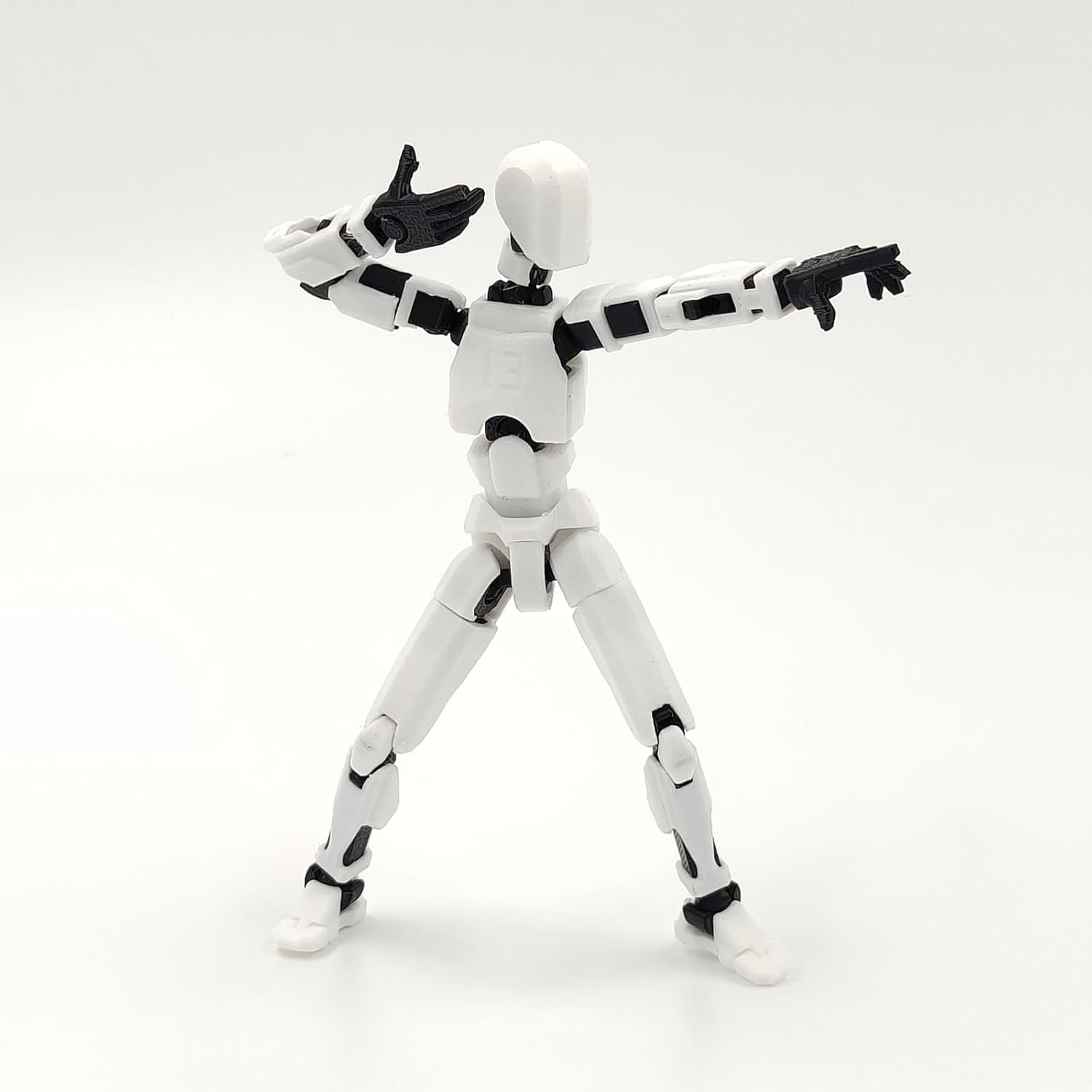 Articulated red robot action figure with multiple joints, made of durable plastic, measuring approximately 4 x 17 x 2 cm.