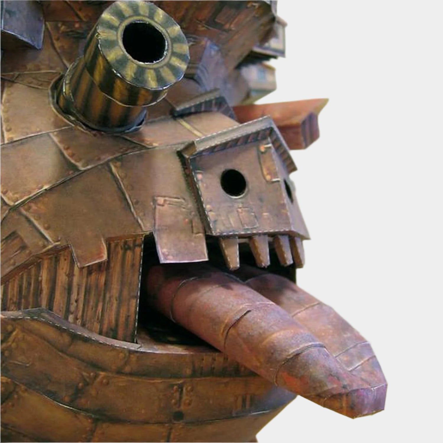 DIY papercraft model of Howl's Moving Castle, designed for a detailed, 50 cm tall display, packaged in a charming cartoon box