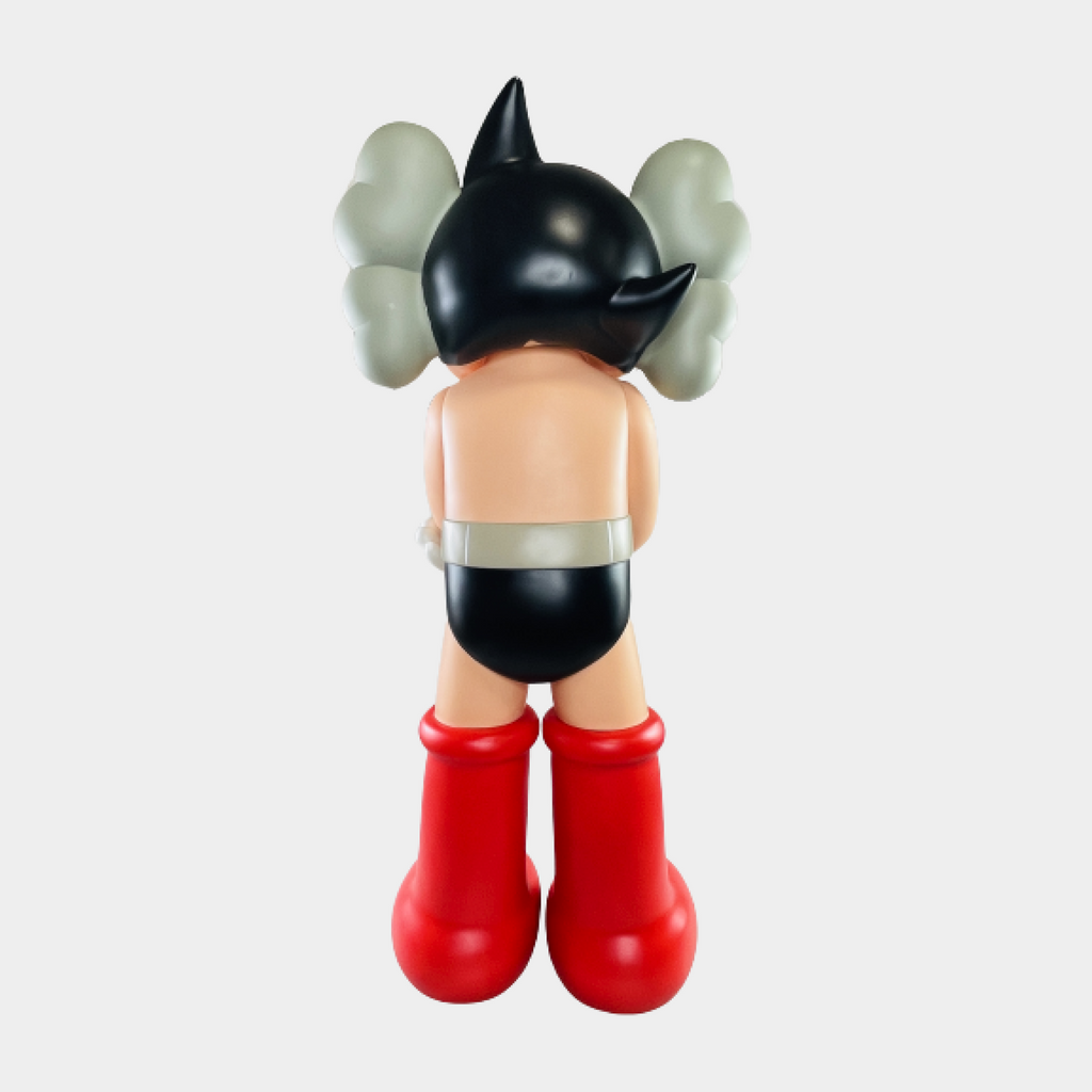 Bright and lively Astro Boy doll inspired by Sesame Street, posed with elegant gentlemanly style