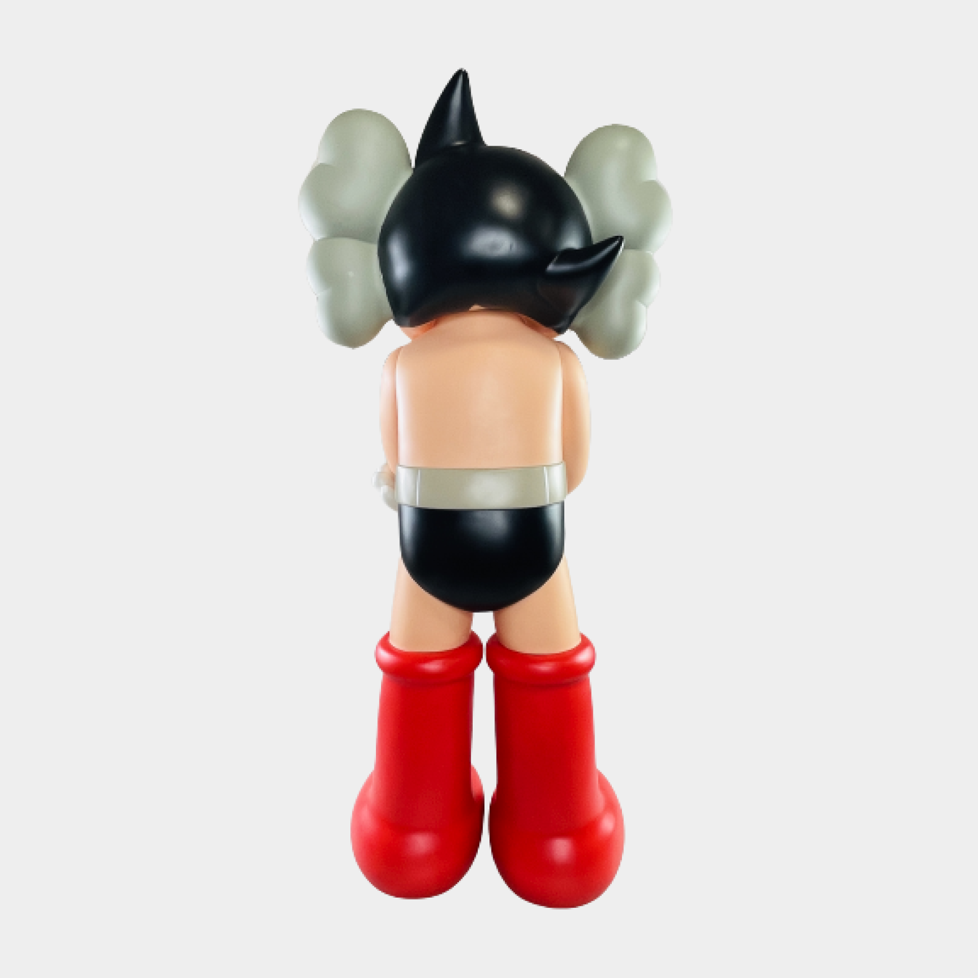 Bright and lively Astro Boy doll inspired by Sesame Street, posed with elegant gentlemanly style