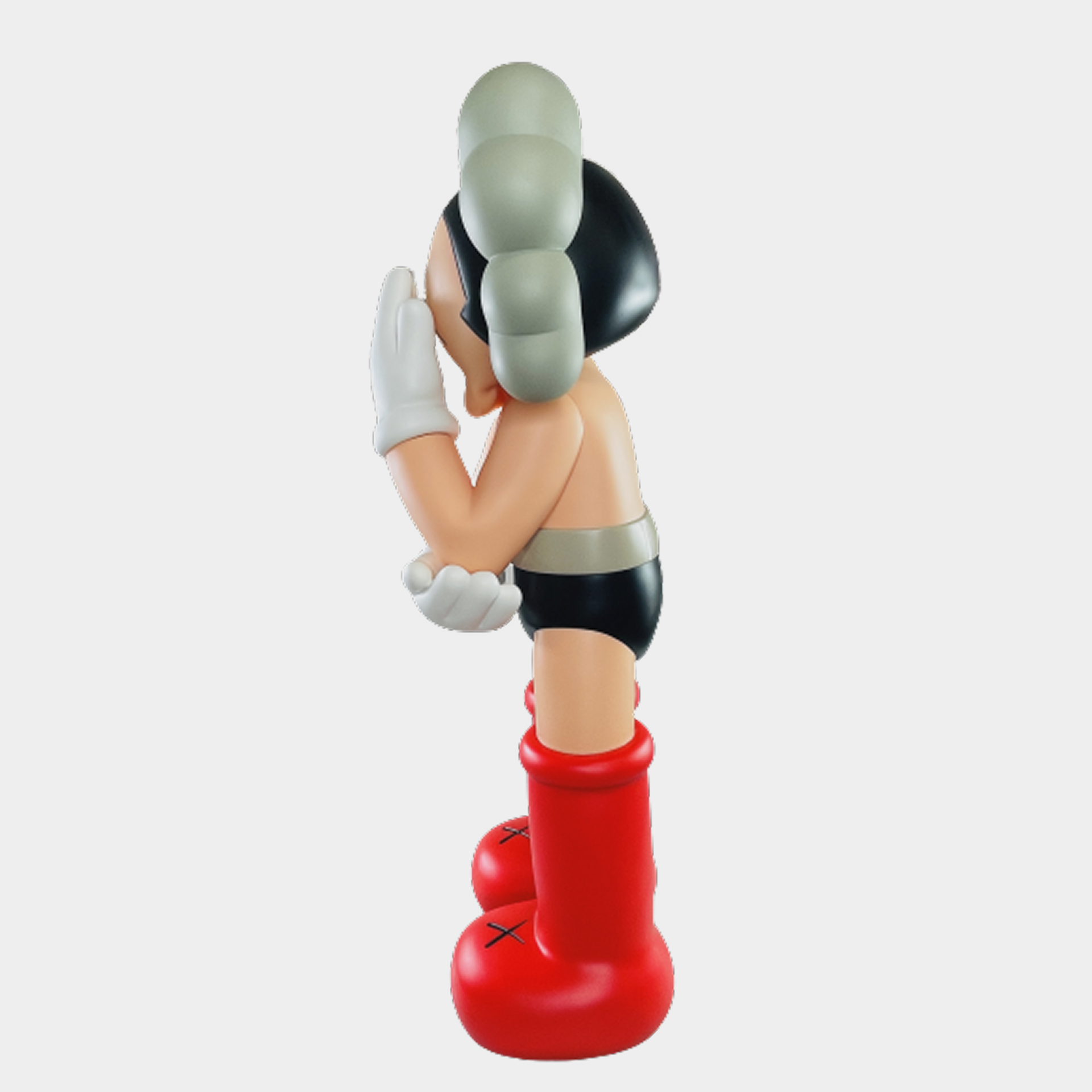 Bright and lively Astro Boy doll inspired by Sesame Street, posed with elegant gentlemanly style