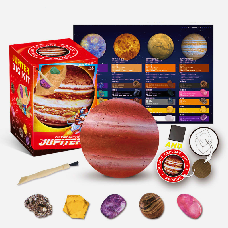 Children's excavation toy set with a planet model, excavation tools, brush, gemstones/fossils, and an educational poster designed for STEM learning