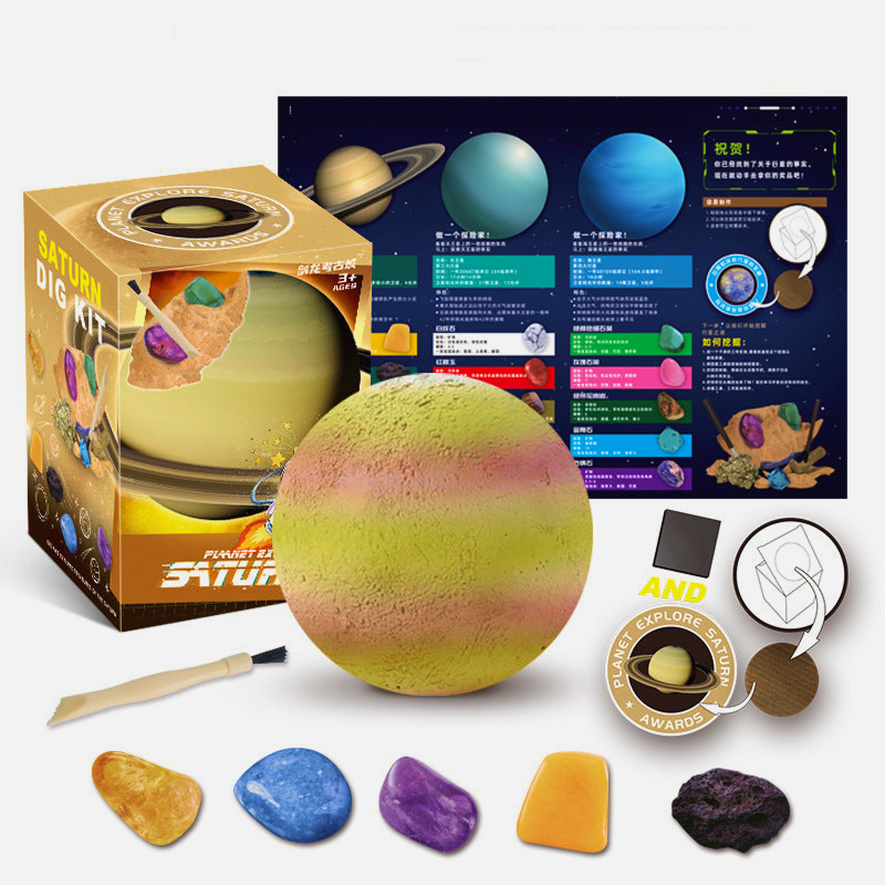 Children's excavation toy set with a planet model, excavation tools, brush, gemstones/fossils, and an educational poster designed for STEM learning