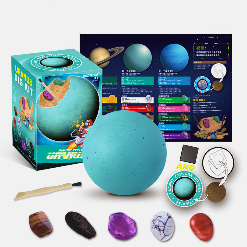 Children's excavation toy set with a planet model, excavation tools, brush, gemstones/fossils, and an educational poster designed for STEM learning