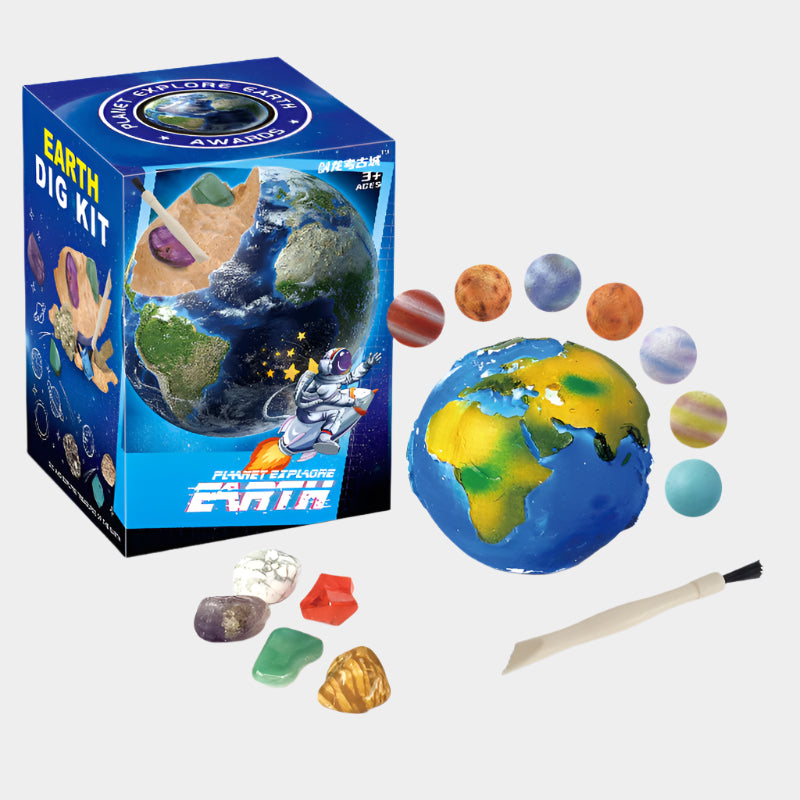 Children's excavation toy set with a planet model, excavation tools, brush, gemstones/fossils, and an educational poster designed for STEM learning