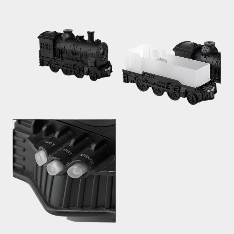 Retro-style small train aromatherapy humidifier in train black with remote control, featuring a large fog spray, dual mist outlets, and a square desktop design