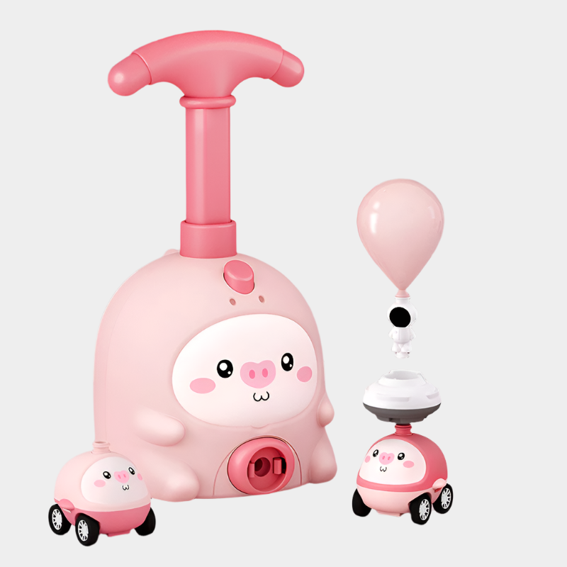 Pig-shaped aerodynamic balloon car educational toy made from durable ABS plastic for kids aged 7-14, demonstrating fun physics in action