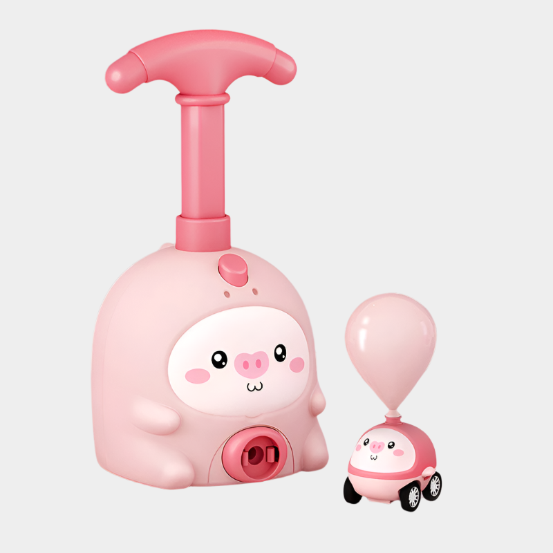 Pig-shaped aerodynamic balloon car educational toy made from durable ABS plastic for kids aged 7-14, demonstrating fun physics in action
