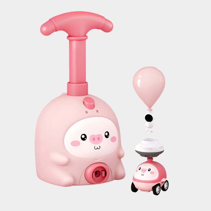 Pig-shaped aerodynamic balloon car educational toy made from durable ABS plastic for kids aged 7-14, demonstrating fun physics in action