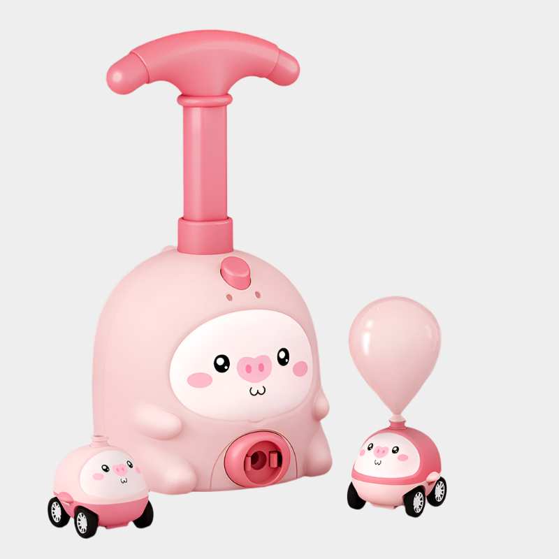 Pig-shaped aerodynamic balloon car educational toy made from durable ABS plastic for kids aged 7-14, demonstrating fun physics in action