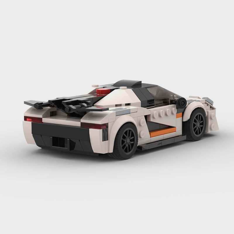 Koenigsegg ONE:1 building blocks set featuring self-locking ABS plastic bricks to construct a detailed supercar model, measuring approximately 8.5 x 19 x 8 cm