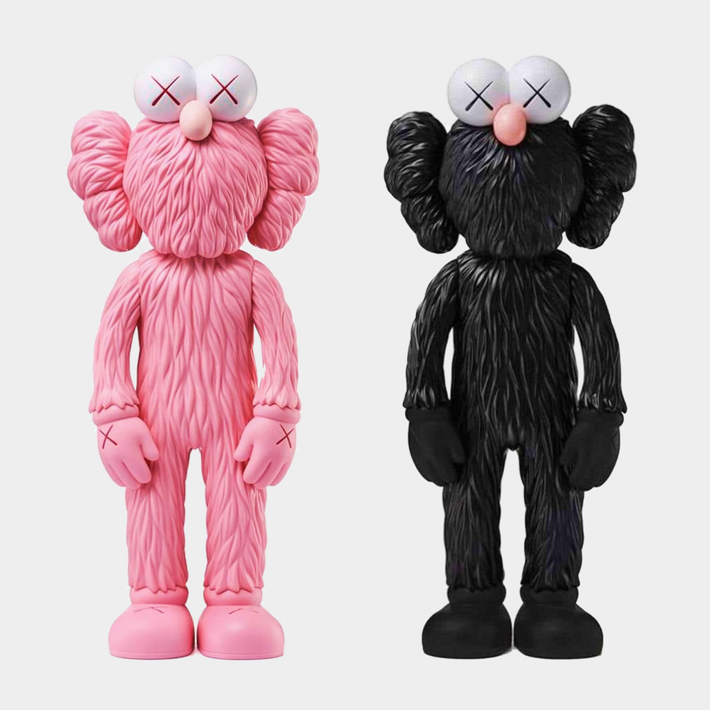 KAWS Companion figure in pink and black from the BFF Open Edition series, measuring 35.6 x 16 x 9.9 cm