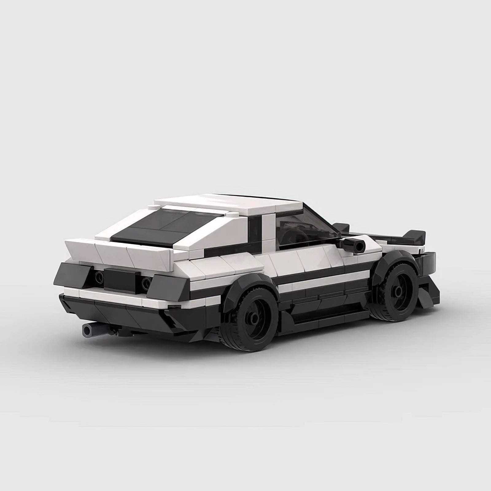 Toyota AE86 GT building blocks set with authentic black-and-white panda design, made of high-quality ABS plastic, approximately 17 x 8 x 5 cm