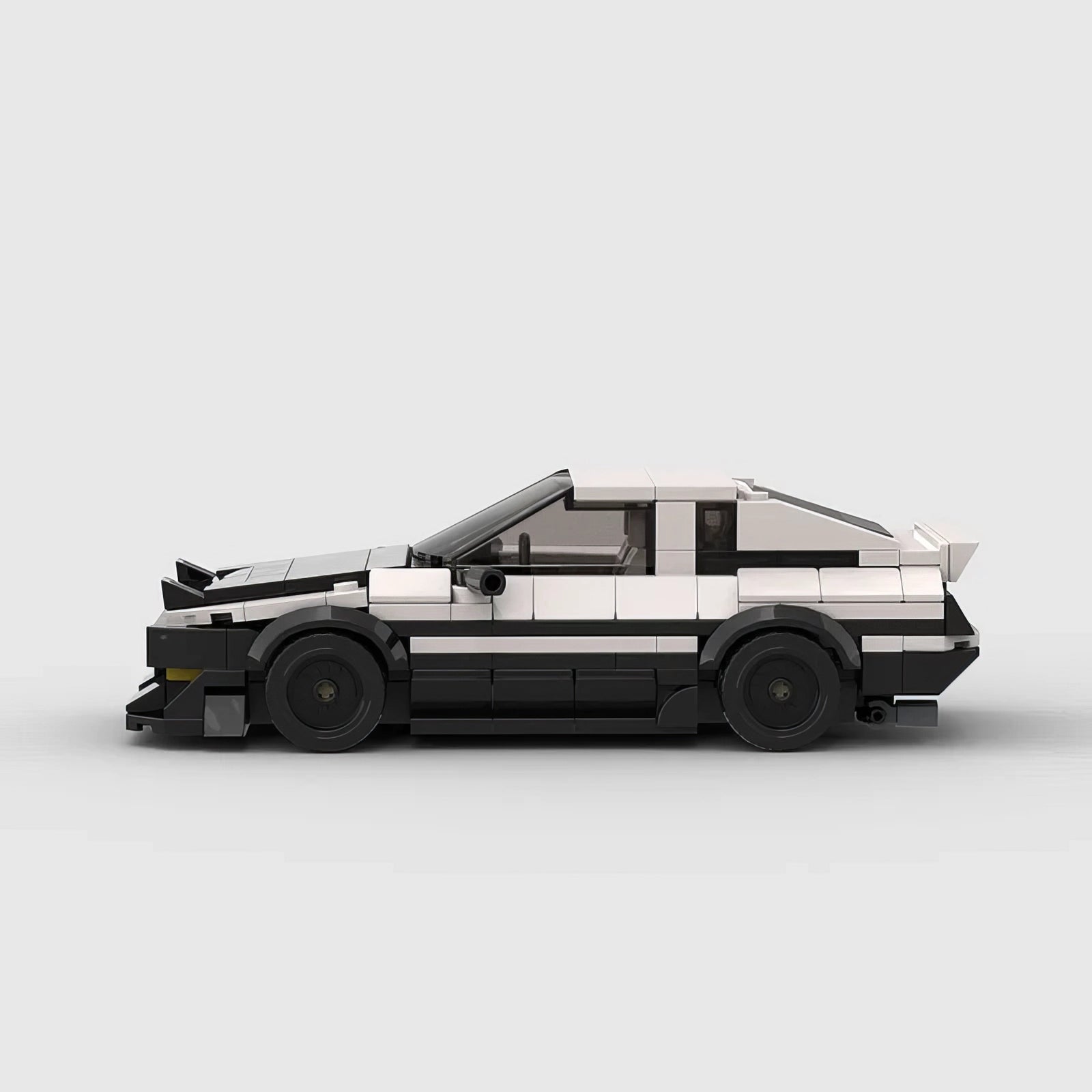 Toyota AE86 GT building blocks set with authentic black-and-white panda design, made of high-quality ABS plastic, approximately 17 x 8 x 5 cm