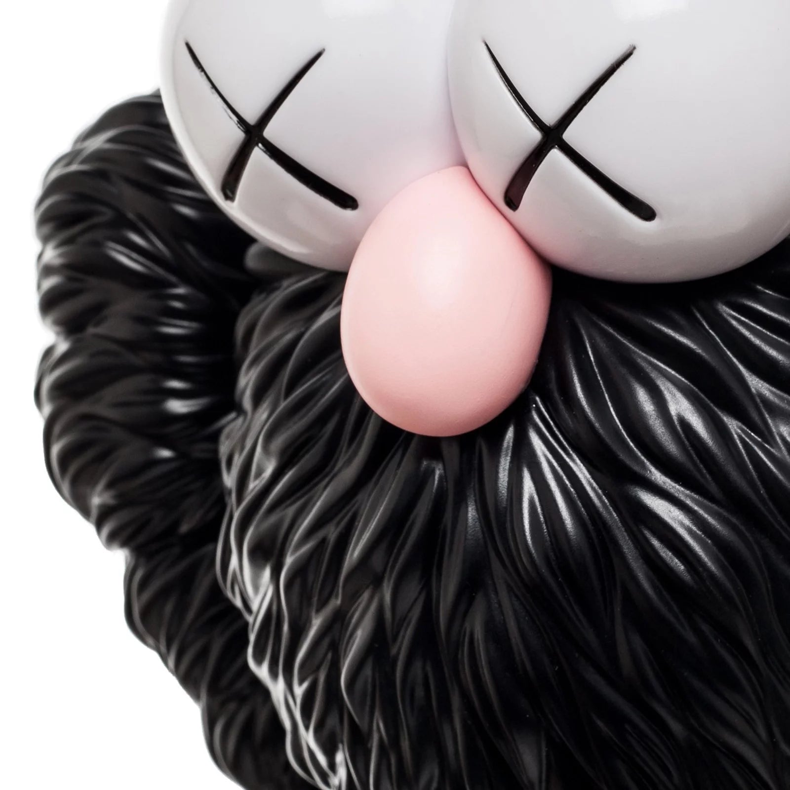 KAWS Companion figure in pink and black from the BFF Open Edition series, measuring 35.6 x 16 x 9.9 cm